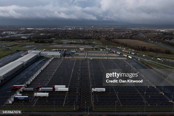 Lorries arrive at the 'Sevington Inland Border Facility' on January 26, 2023 in Ashford, Kent. The multi-million pound Inland Border Facility in...