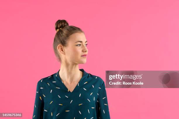 woman in front of a pink background - unleash potential stock pictures, royalty-free photos & images