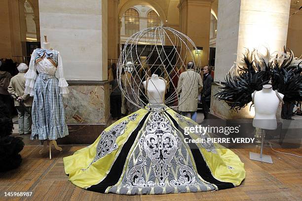 Costumes from the Folies Bergere are displayed at the Palais de la Bourse as part of the "Ventes de folie" auction in Paris on June 8, 2012. The...