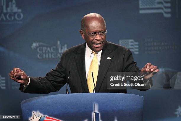 Former Republican Presidential Candidate Herman Cain speaks to guests at the Conservative Political Action Conference at the Donald E. Stephens...