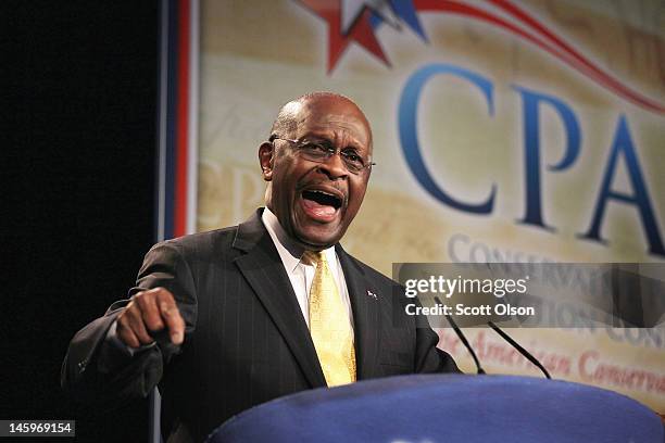 Former Republican Presidential Candidate Herman Cain speaks to guests at the Conservative Political Action Conference at the Donald E. Stephens...