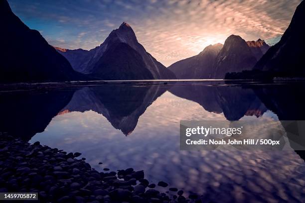scenic view of lake and mountains against sky during sunset,united states,usa - sud foto e immagini stock