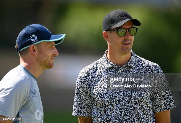 Former England Cricketer Kevin Pietersen speaks to Jos Buttler of England during a England Nets Session at Mangaung Oval on January 26, 2023 in...