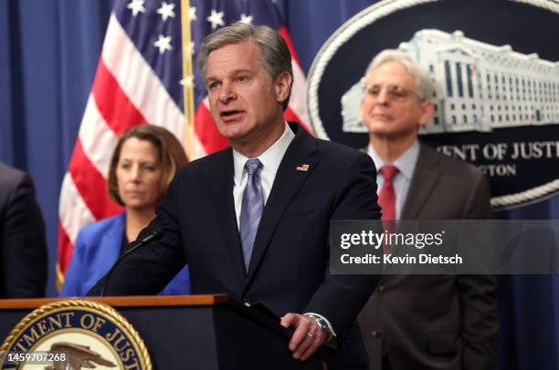 Director of the Federal Bureau of Investigation Christopher Wray , joined by Attorney General Merrick Garland and Assistant Attorney General Lisa...