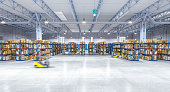 large warehouse with moving vehicle.