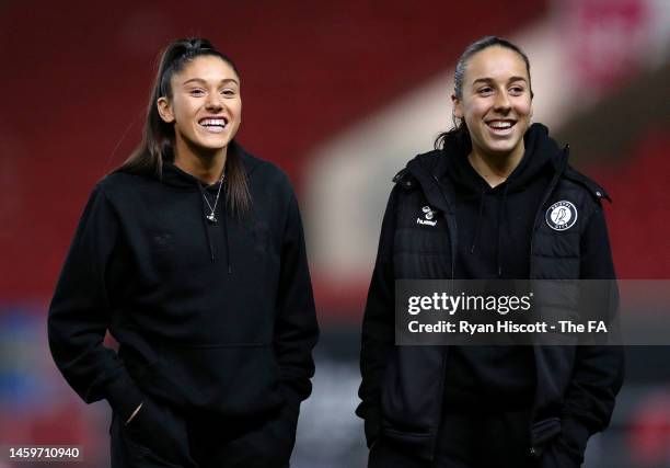 Maddi WIlde of Bristol City laughs with Brooke Aspin prior to the FA Women's Continental Tyres League Cup match between Bristol City and Manchester...