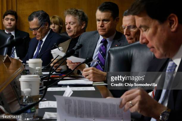 Senate Foreign Relations Committee members Sen. Mitt Romney , Sen. Rand Paul , Sen. Todd Young , Sen. John Barrasso and Sen. Bill Hagerty listen to...