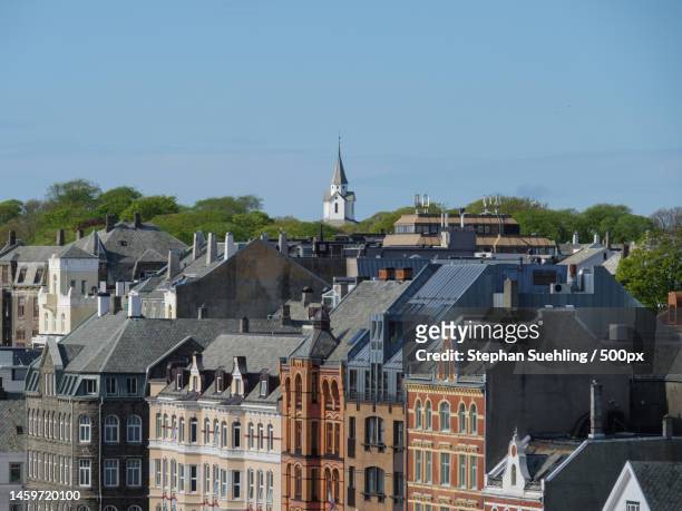 high angle view of buildings in city against clear sky,haugesund,norway - haugesund stockfoto's en -beelden