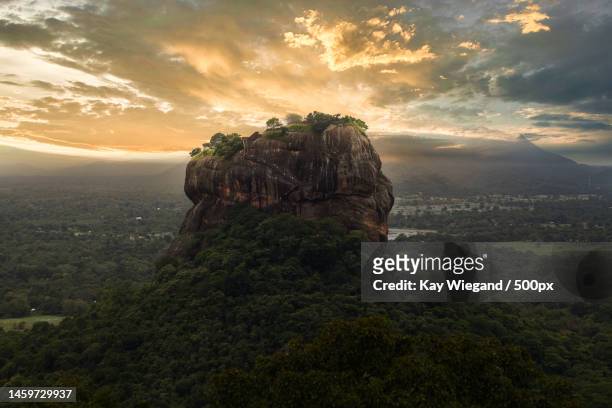 sunset with view from pidurangala mountain to sigiriya lion rock in sri lanka landscape panorama,sigiriya,sri lanka - sigiriya stock pictures, royalty-free photos & images