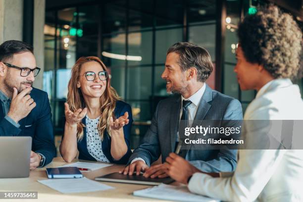 business persons on meeting in the office - business meeting stockfoto's en -beelden