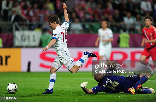 Vaclav Pilar of Czech Republic goes past goalkeeper Vyacheslav Malafeev of Russia to score their first goal during the UEFA EURO 2012 group A match...