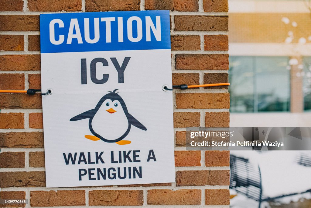 Icy Rocks Sign Caution Icy Warning Sign High-Res Stock Photo - Getty Images