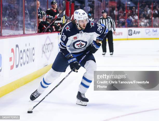 Kevin Stenlund of the Winnipeg Jets skates against the Ottawa Senators during the game at Canadian Tire Centre on January 21, 2023 in Ottawa,...