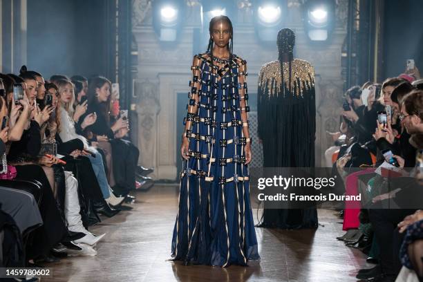 Model walks the runway during the Maison Sara Chraibi Haute Couture Spring Summer 2023 show as part of Paris Fashion Week on January 26, 2023 in...