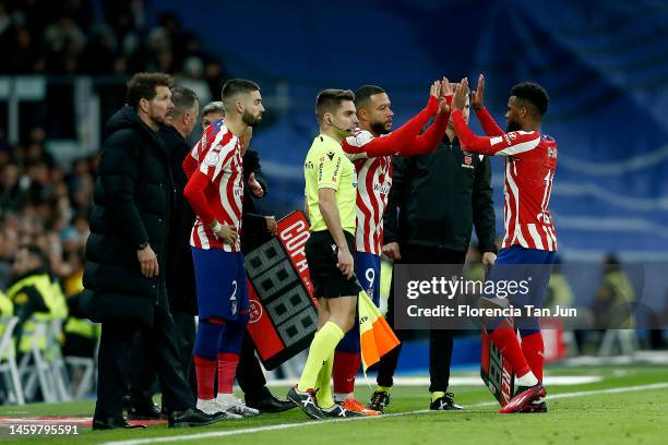 Thomas Lemar of Atletico de Madrid being substitute by Memphis Depay of Atletico de Madrid during the Copa Del Rey Quarter Final match between Real...