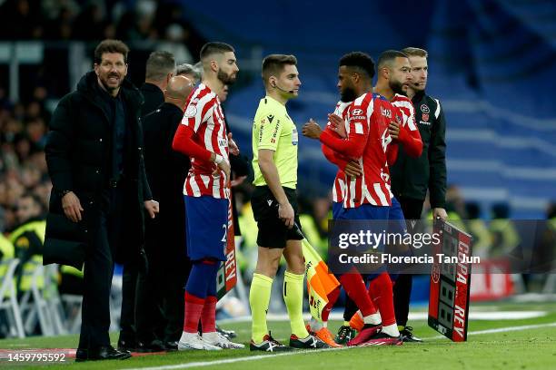 Thomas Lemar of Atletico de Madrid being substitute by Memphis Depay of Atletico de Madrid during the Copa Del Rey Quarter Final match between Real...