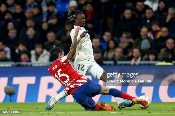 Eduardo Camavinga of Real Madrid being fouled by Stefan Savic of Atletico de Madrid during the Copa Del Rey Quarter Final match between Real Madrid...