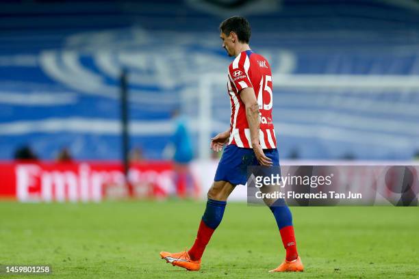 Stefan Savic leaves the pitch after being shown a red card during the Copa Del Rey Quarter Final match between Real Madrid and Atletico de Madrid at...