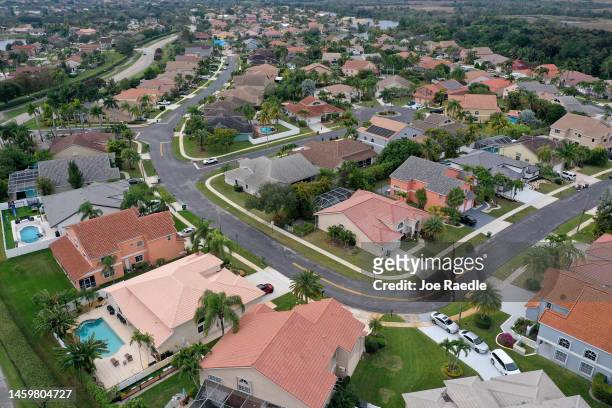 In an aerial view, homes sit on lots in a neighborhood on January 26, 2023 in Boca Raton, Florida. As the Federal Reserve continues aggressive...