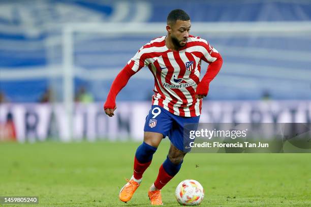 Memphis Depay of Atletico de Madrid in action during the Copa Del Rey Quarter Final match between Real Madrid and Atletico de Madrid at Estadio...