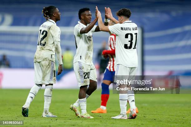 Vinicius Junior of Real Madrid celebrates after wining their game with Mario Martin of Real Madrid during the Copa Del Rey Quarter Final match...