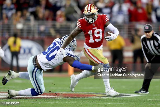 Deebo Samuel of the San Francisco 49ers carries the ball against the San Francisco 49ers during the second half in the NFC Divisional Playoff game at...