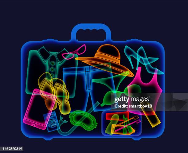 x-ray of holiday suitcase - smuggling stock illustrations