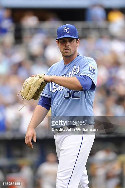 Pitcher Vin Mazzaro of the Kansas City Royals looks to the dugout as he walks off the field after the third out of the inning in the game against the...
