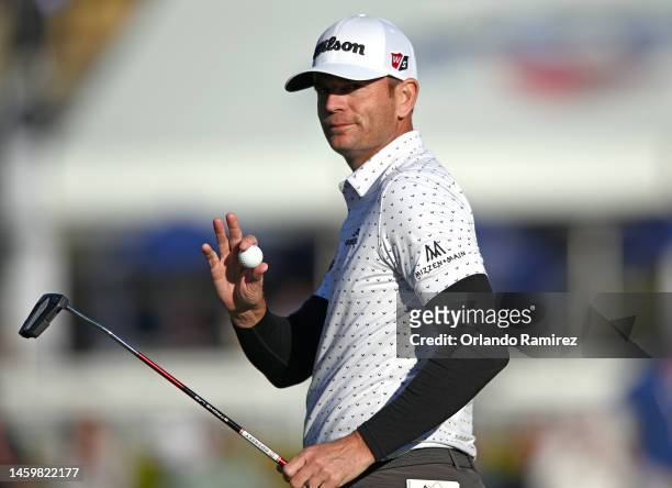Brendan Steele of the United States reacts after a putt on the 18th green of the South Course during the second round of the Farmers Insurance Open...