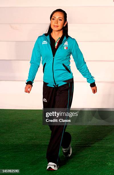 Model shows on the catwalk the new mexican uniforms during the presentation of the uniforms that Mexican athletes will use in the Olympic Games of...