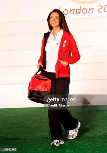 Model shows on the catwalk the new mexican uniforms during the presentation of the uniforms that Mexican athletes will use in the Olympic Games of...