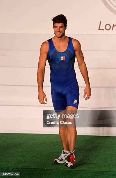 Model shows on the catwalk the new mexican uniforms during the presentation of the uniforms that Mexican athletes will use in the Olympic Games of...