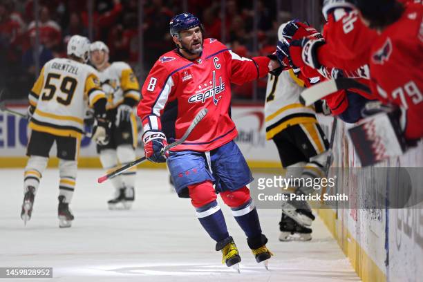 Alex Ovechkin of the Washington Capitals celebrates after scoring a goal against the Pittsburgh Penguins during the first period at Capital One Arena...