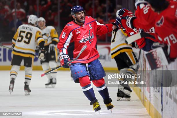 Alex Ovechkin of the Washington Capitals celebrates after scoring a goal against the Pittsburgh Penguins during the first period at Capital One Arena...