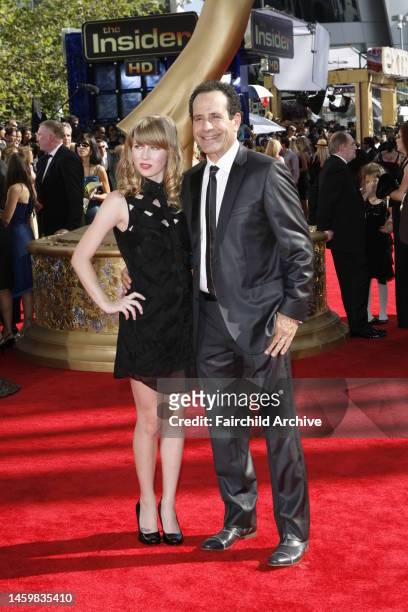 Sophie Shalhoub and Tony Shalhoub attend the 61st Primetime Emmy Awards at the NOKIA Theatre. Shalboub wears Hugo Boss.