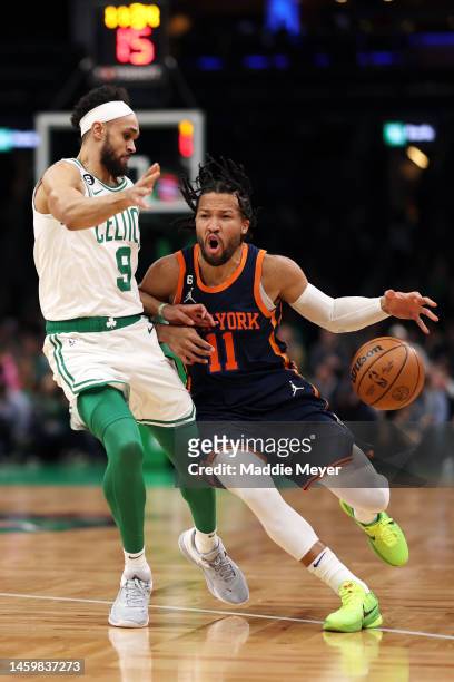 Derrick White of the Boston Celtics defends Jalen Brunson of the New York Knicks during the first half at TD Garden on January 26, 2023 in Boston,...