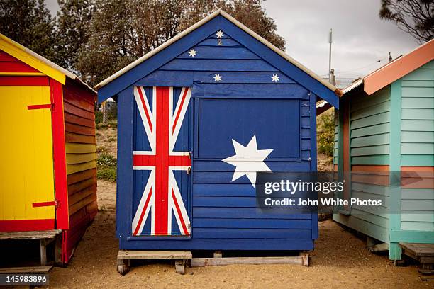 australian flag painted on beach hut. australia. - brighton beach stock pictures, royalty-free photos & images