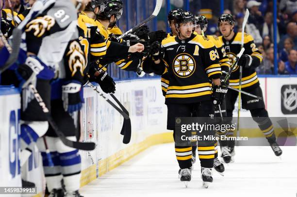 Brad Marchand of the Boston Bruins celebrates a goal in the second period during a game against the Tampa Bay Lightning at Amalie Arena on January...