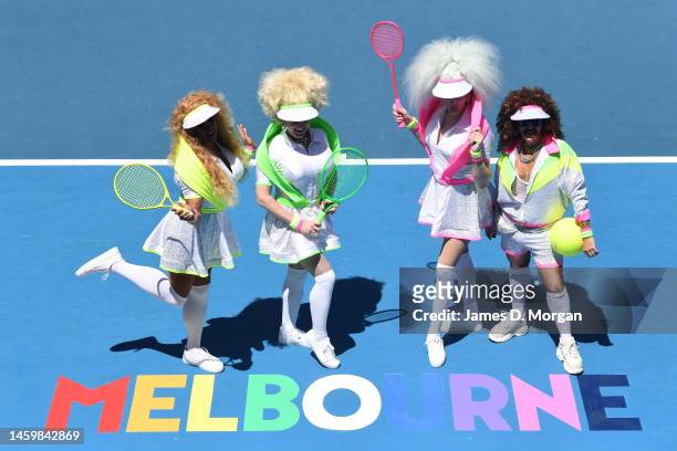 Drag queens stand beside a Melbourne rainbow sign on Pride Day during day 12 of the 2023 Australian Open at Melbourne Park on January 27, 2023 in...