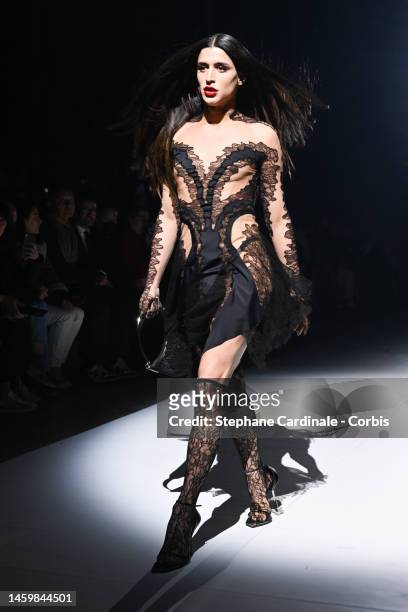 Venezuelan musician Arca walks the runway during the Thierry Mugler : Runway - Paris Fashion Week - Haute Couture Spring Summer 2023 show as part of...