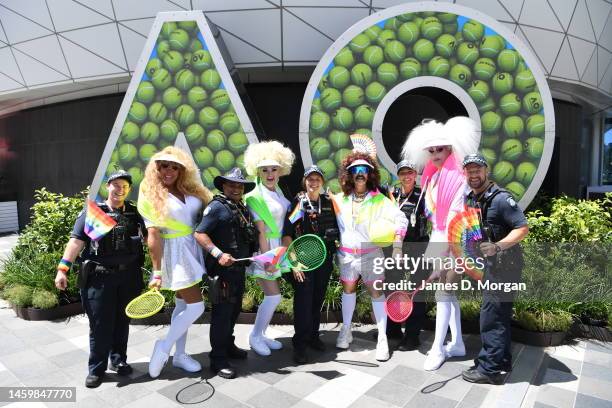 Drag queens stand alongside Victorian police officers outside Rod Laver Arena on Pride Day during day 12 of the 2023 Australian Open at Melbourne...