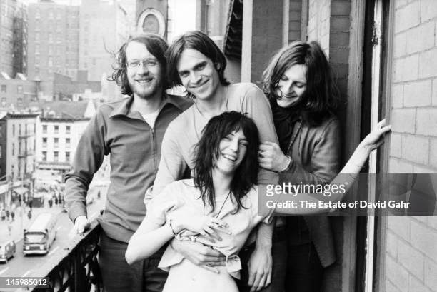 Musician Lee Crabtree, singer songwriter Eric Anderson, singer and poet Patti Smith, and filmmaker and videographer Michel Auder pose for a portrait...