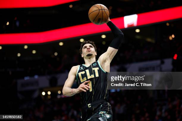 LaMelo Ball of the Charlotte Hornets attempts a lay up following a foul call during the second half of the game against the Chicago Bulls at Spectrum...