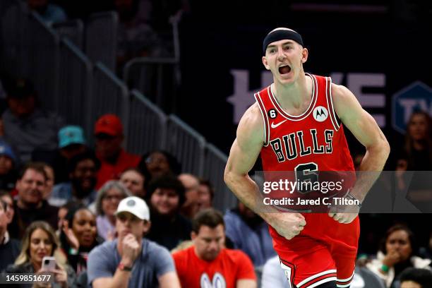 Alex Caruso of the Chicago Bulls reacts following a basket during the second half of the game against the Charlotte Hornets at Spectrum Center on...