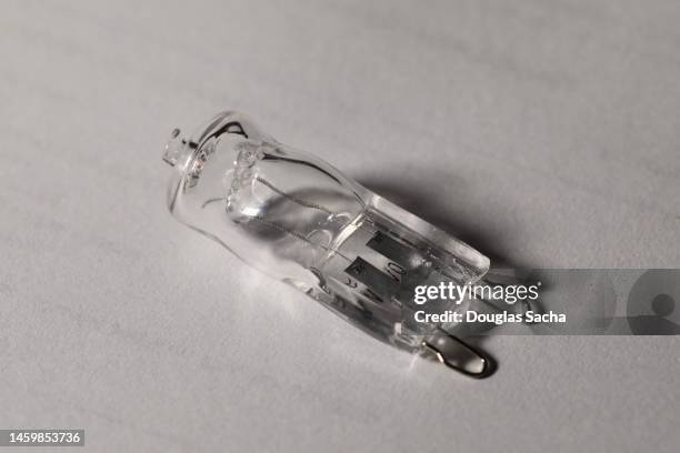 halogen lamp type light bulb - g9 - halogen light stock pictures, royalty-free photos & images