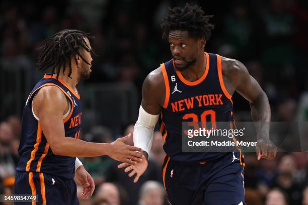 Julius Randle of the New York Knicks and Jalen Brunson celebrate during the second half against the Boston Celtics at TD Garden on January 26, 2023...
