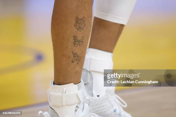 Detail shot of the tattoos on the leg of Stephen Curry of the Golden State Warriors during the game against the Memphis Grizzlies at Chase Center on...