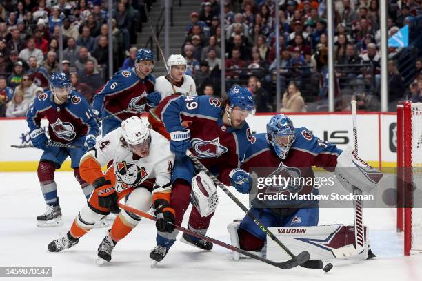 Samuel Girard and goalie Pavel Francouz of the Colorado Avalanche stop a shot on goal by Max Comtois of the Anaheim Ducks in the third period at Ball...