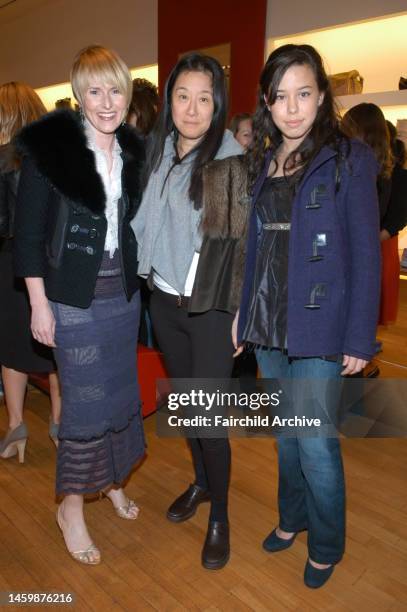 Amy Astley, Vera Wang and Cecilia Becker attend Teen Vogue and Victoria Traina's holiday shopping event at Hogan Spring Street.