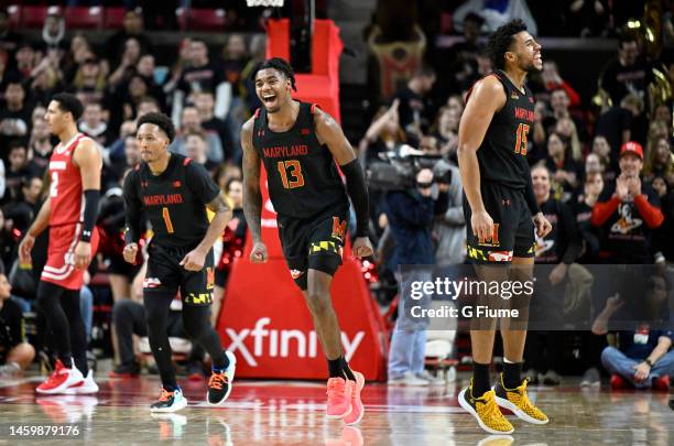 Jahmir Young, Hakim Hart and Patrick Emilien of the Maryland Terrapins celebrate in the second half against the Wisconsin Badgers at Xfinity Center...